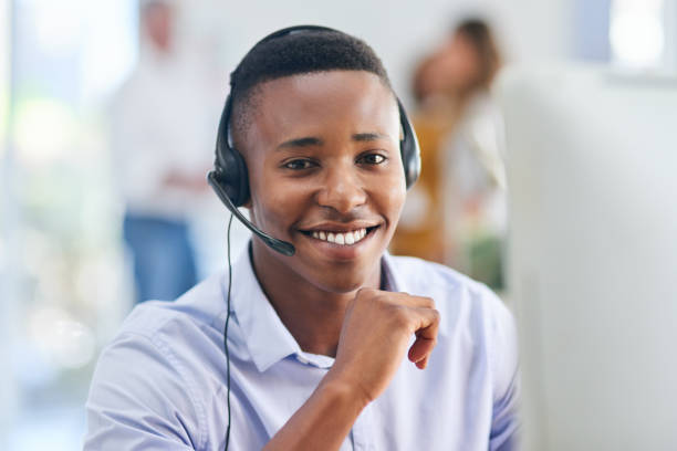 Portrait of a male agent working in a call centre